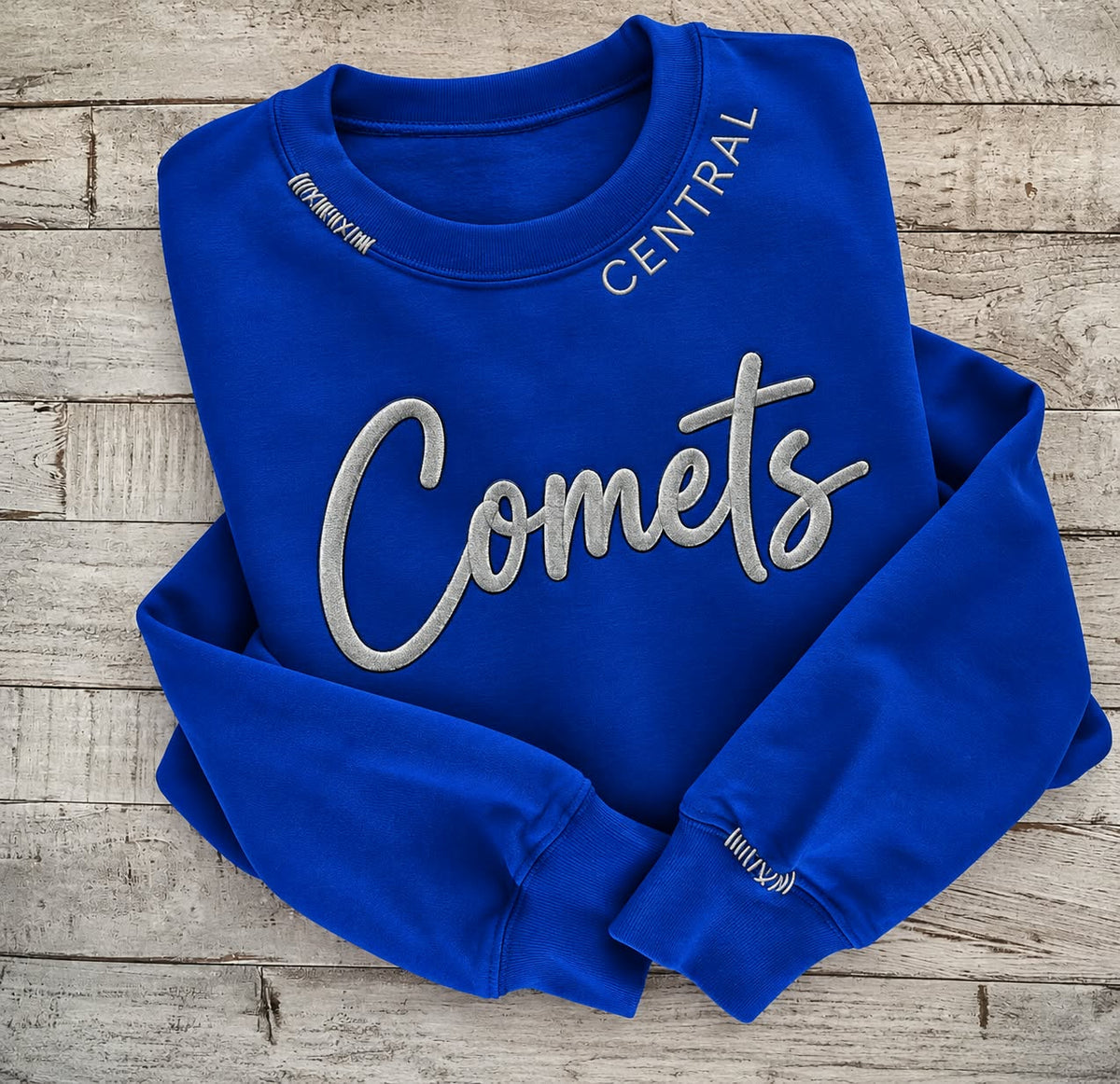 Royal blue Central Comets crewneck with silver gray 3D puff Comets script and CENTRAL stitched on the collar