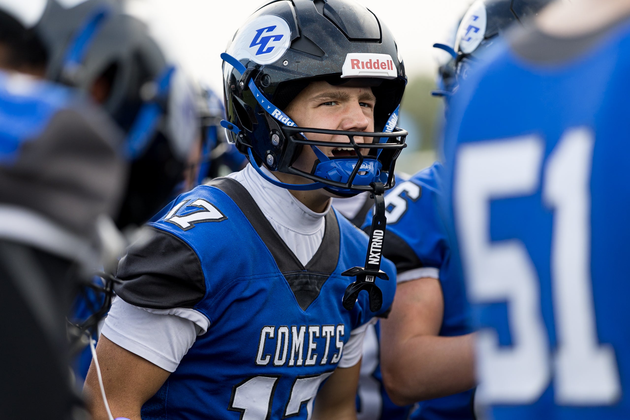 Clifton Central Comets varsity football player #17 shouting in the huddle during the season opener vs. Salt Fork, August 21, 2026